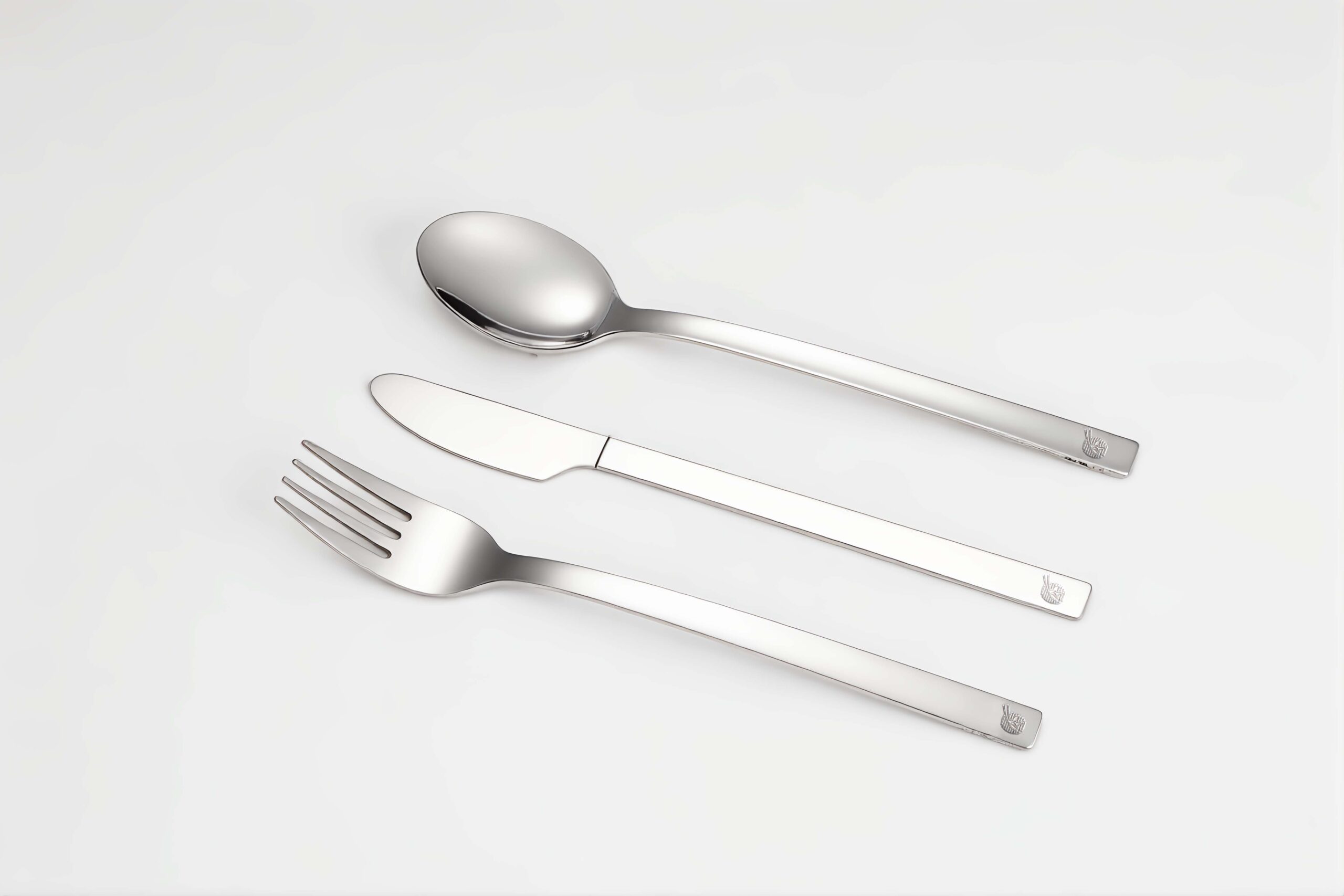 A sleek, custom titanium spork for airline use