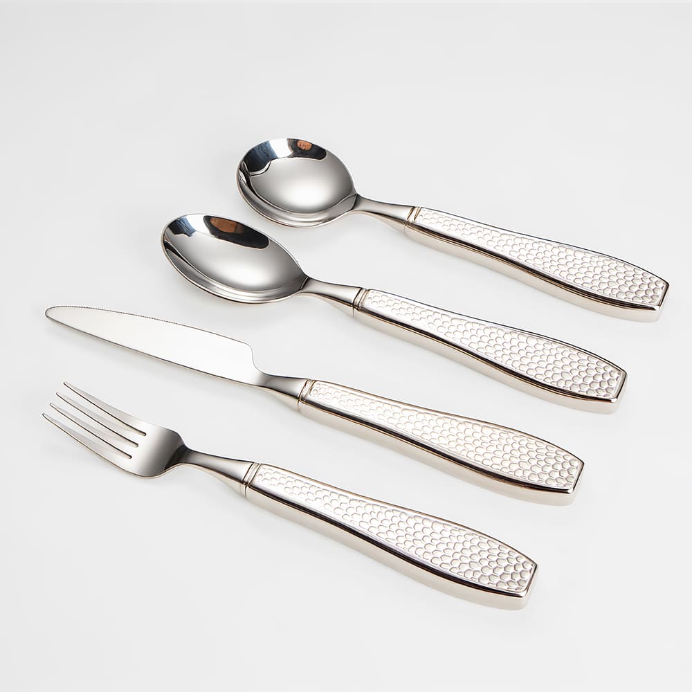 child using adaptive utensil at mealtime